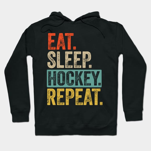 Eat sleep hockey repeat retro vintage Hoodie by Lyume